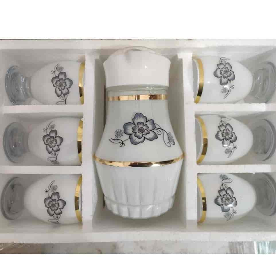 سرویس پارچ و جام ۷ پارچه سفید طرح گل طوسی